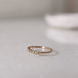 Finished: Astrid Top Covered Diamond Band with Light Green Tourmalines