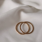 Oval Goldie med Gömd Handgravyr