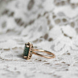 Solitaire Ring with Dark Green Tourmaline and Diamond Halo