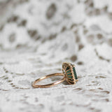 Solitaire Ring with Dark Green Tourmaline and Diamond Halo