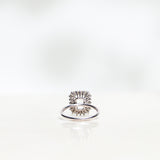 Solitaire Ring with White Topaz and Diamond Halo in White Gold