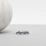 Finished: Lily Tiny Diamond Drop Ring in White Gold with Dark Blue Sapphire Row